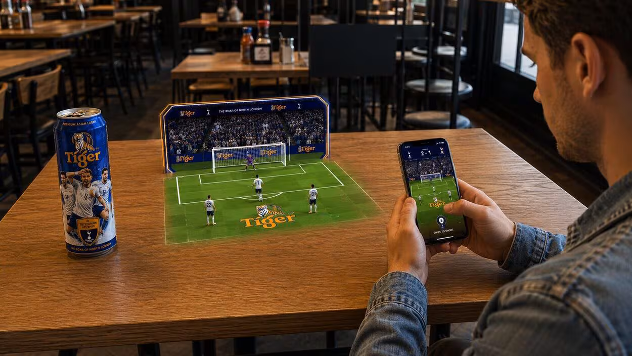 Tiger Beer WebAR penalty shootout playing out as a 3D pitch on a pub tabletop.